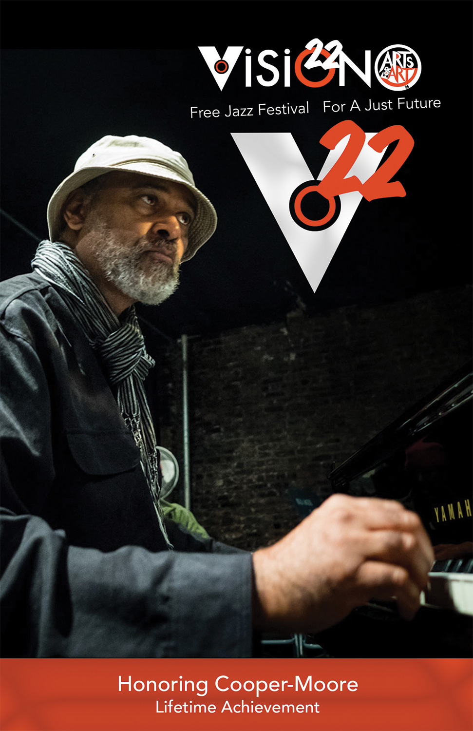 full color cover for the 22 Vision Festival brochure featuring a picture of pianist Cooper-Moore and the V22 logo